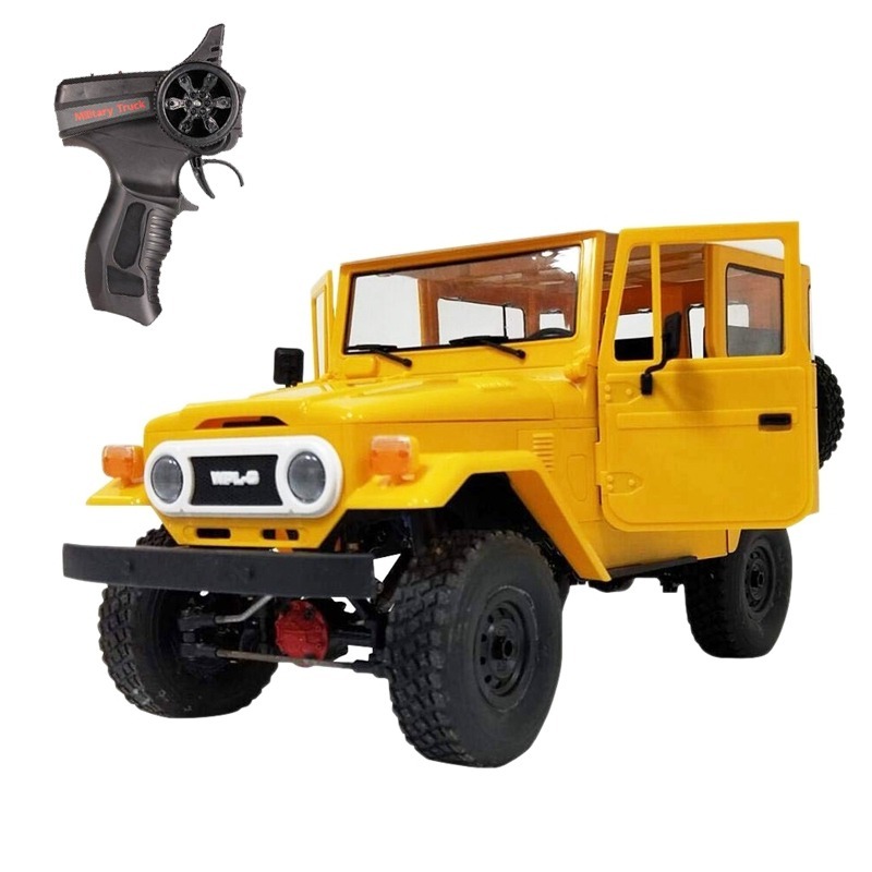 Фото Радиоуправляемый внедорожник WPL Toyota FJ40 желтый 4WD масштаб 1:16 2.4G (WPLC-34-YELLOW) - интернет-магазин МегаТерем в Москве